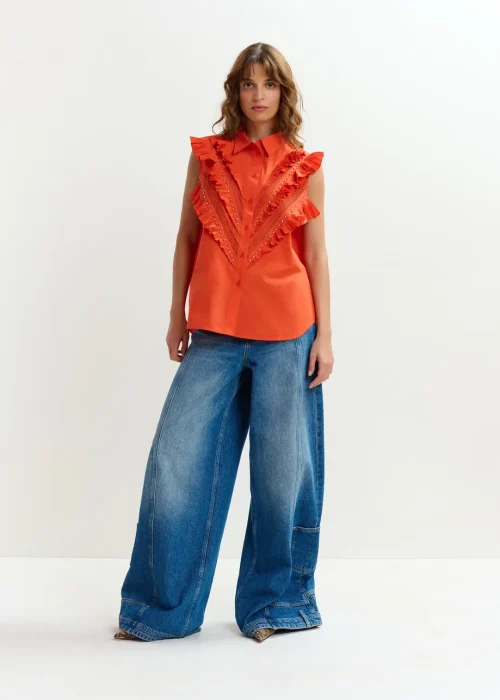 CAMISA SIN MANGAS CON VOLANTES EN PECHERA