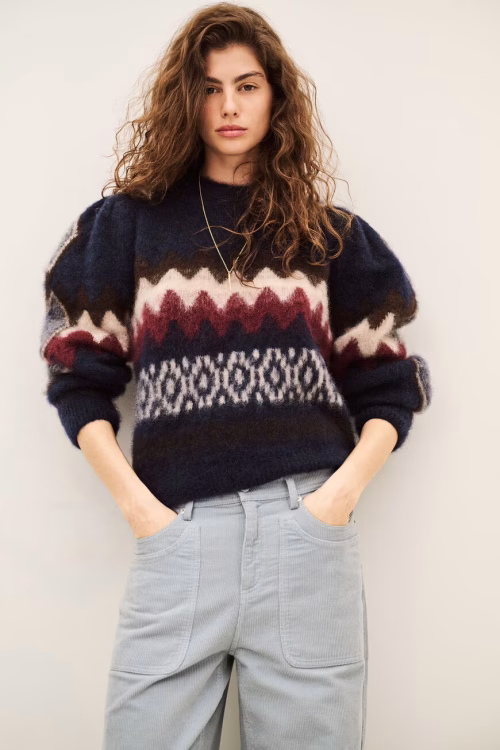 JERSEY LANA CON MOTIVO GEOMÉTRICO Y MANGA ABULLONADA